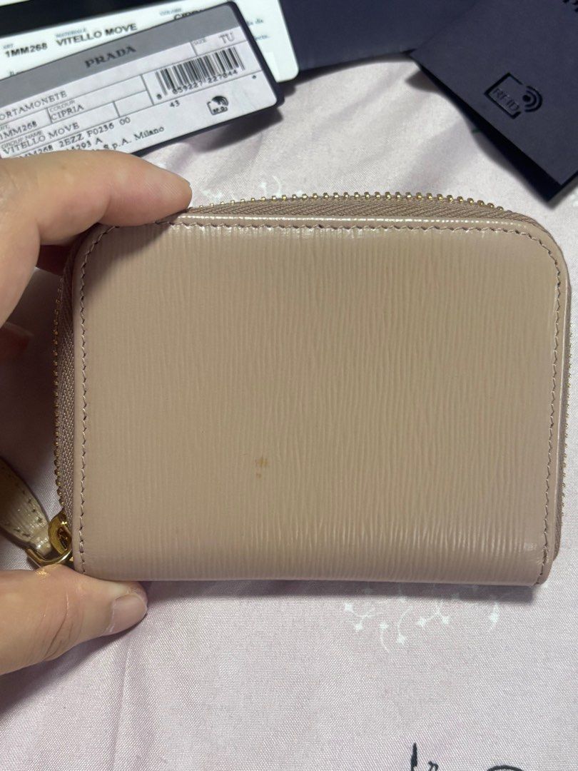 Authentic Prada Saffiano Leather Small Zip around Wallet (Category: Luxury Bags & Wallets) located in Calamba. Submitted by cur8d (Listing ID 1382566413, Image 3). Description: Authentic Prada Saffiano Leather Small Zip around Wallet color: Cipria Meet up for serious buyers only Shipping: Insurance premium c/o buyer gifted but never used rfs: need funds .
