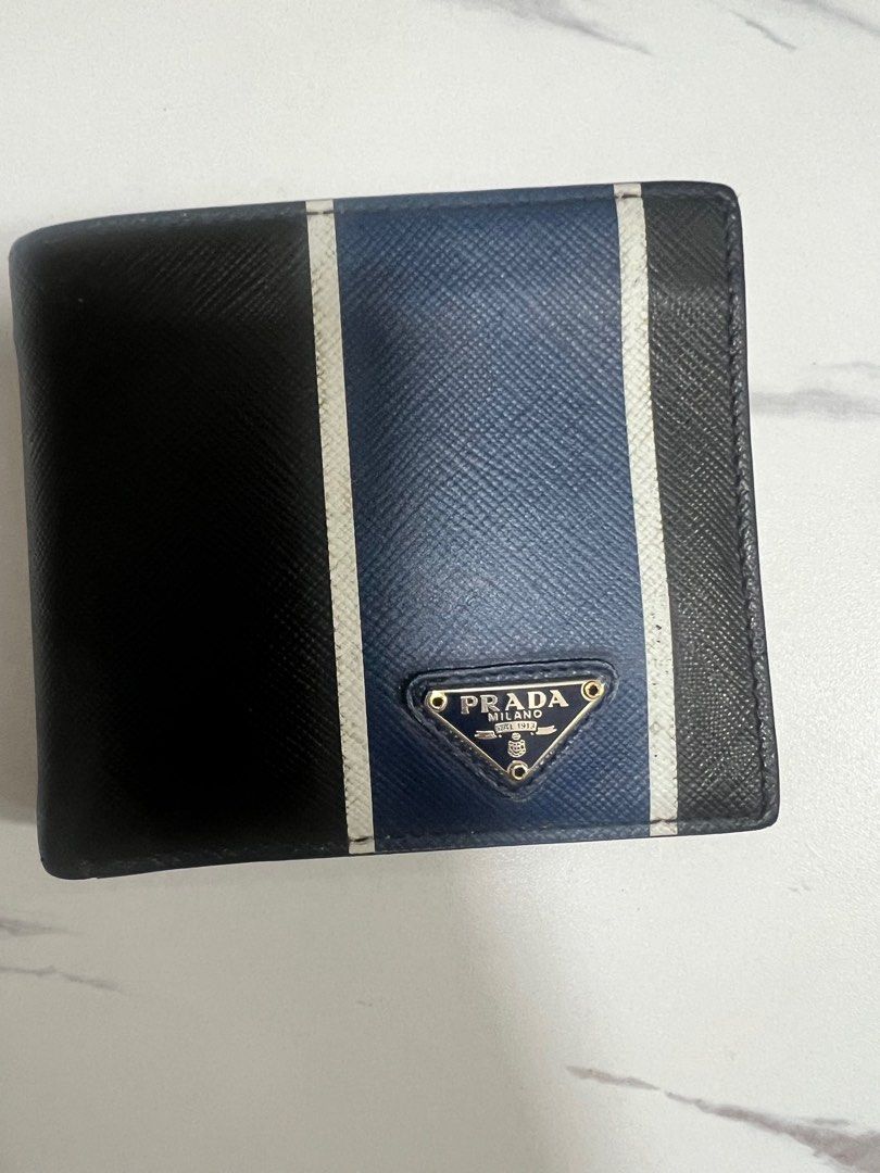 authentic Prada Wallet (Category: Luxury Bags & Wallets) located in Mandaluyong City. Submitted by carl040192 (Listing ID 1382517509, Image 1). Description: guaranteed authentic / box.