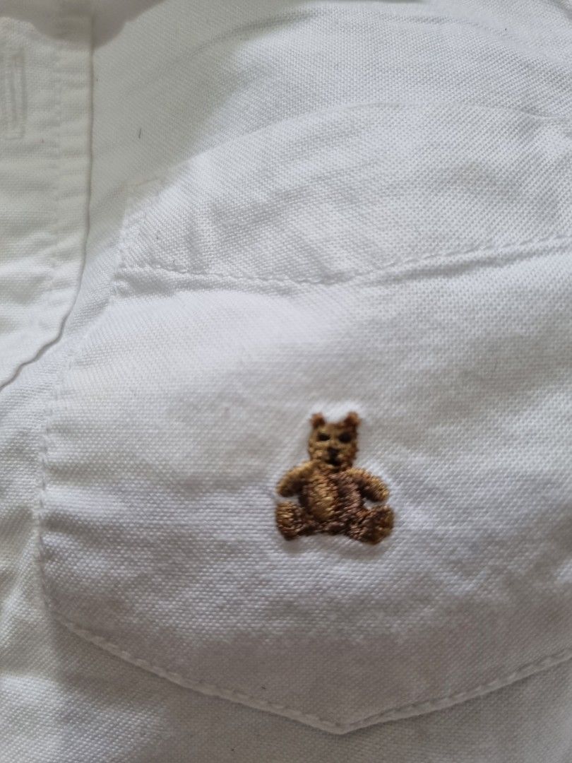 Baby Gap White Longsleeve Polo (Category: Babies & Kids Fashion) located in Quezon City. Submitted by TaraSelling (Listing ID 1382550711, Image 2). Description: Size on tag: 2yo w/ washable stains as seen on photos, due to storage. Hence, selling low..