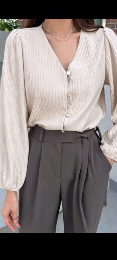 Beige Vneck Longsleeve Officewear (Category: Blouses) located in Rizal. Submitted by Babyfume (Listing ID 1382638878, Image 2). Description: used around 3 times only rfs: not my style anymore, a bit fit on me na (gained weight) buttons can be removed to use it like a cardigan.