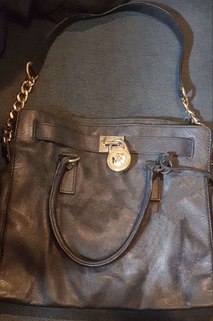 Black MK Hamilton 2-way bag (Category: Cross-body Bags) located in Quezon City. Submitted by practibagsplusmnl (Listing ID 1382588092, Image 1). Description: Black Michael Kors (MK) Hamilton 2-way bag; gold hardwares: sing combination leather-gold chain. Just needs leather cleaning, conditioning..