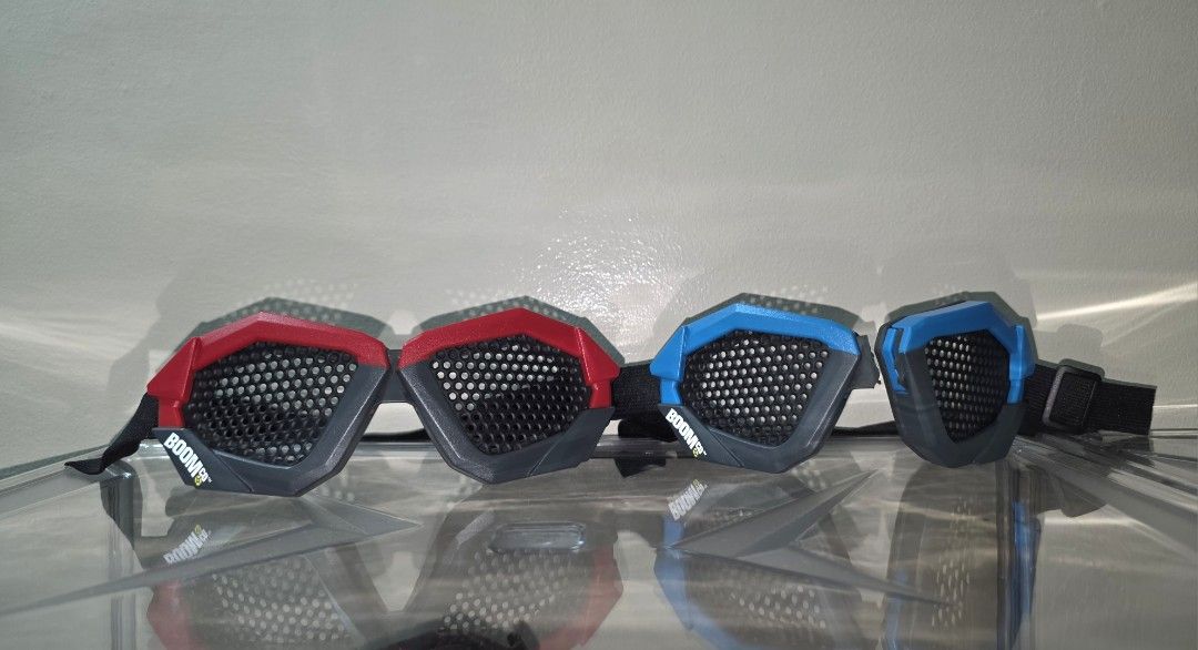 BOOMco. Red & Blue Eye Gear Protector (Category: Travel Essentials & Accessories) located in Makati City. Submitted by code_blue (Listing ID 1382578866, Image 1). Description: Red Gear has no Damage, just adjust the strap for a tight fit. Blue Gear's rubber split in half, In need of repair..