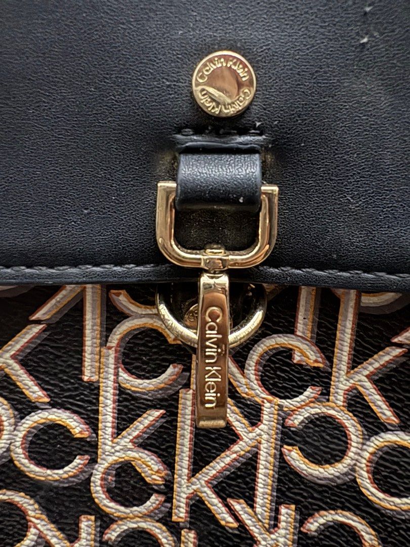 Calvin Klein Signature Mini Backpack | Khaki Black (Category: Luxury Bags & Wallets) located in Manila. Submitted by weya_ (Listing ID 1382633016, Image 3). Description: issue: has cat scratches (see pic) needs a lil bit of cleaning negotiable.