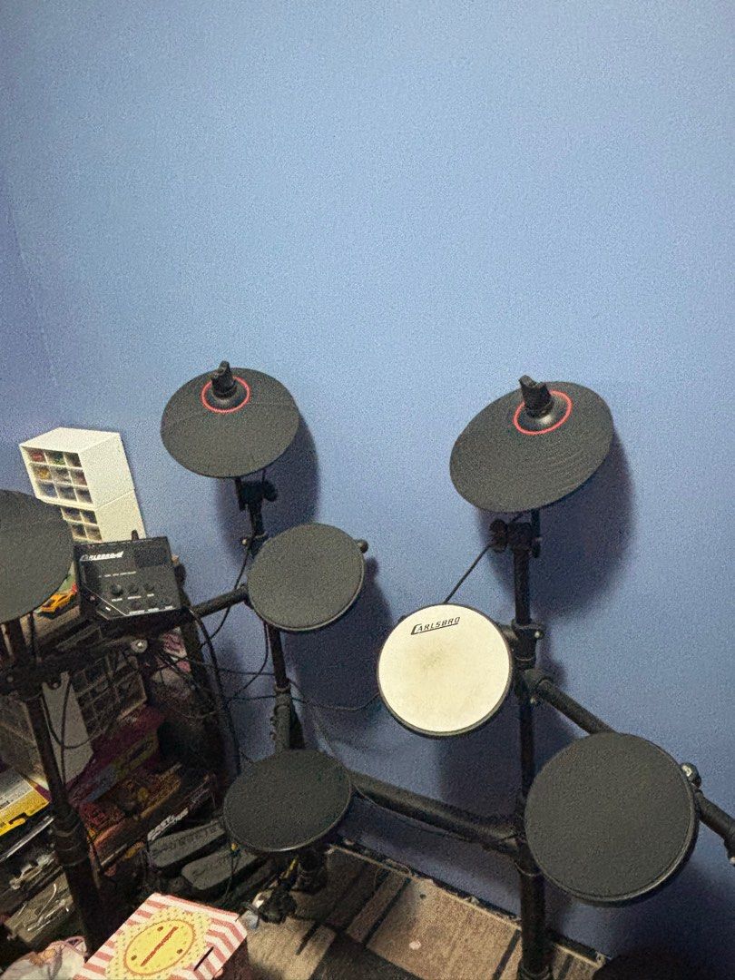 CARLSBRO CSD100 ELECTRONIC DRUM KIT (Category: Musical Instruments) located in Manila. Submitted by kachomp_collects (Listing ID 1382677846, Image 1). Description: CARLSBRO CSD100 ELECTRONIC DRUM KIT Working parin lahat except yung sa snare drums need lang ayusin yung loob. Yung sa kick and hihat pedal may bali pero working parin naman sila lahat nilagyan ko rin ng glue stick dati para di tuluyan maghiwalay yung plastic. .