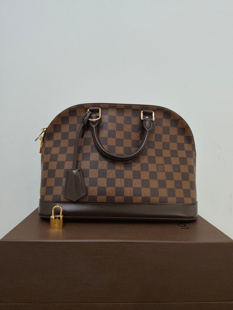 LOUIS VUITTON N53151 ALMA PM DAMIER EBENE CANVAS GHW CT4174 (Category: Bags & Wallets) located in Kuala Lumpur. Submitted by larueonlinestore (Listing ID 1382590131, Image 1). Description: LAR-4027-LV (Pre-owned) Brand - LOUIS VUITTON Model - N53151 ALMA PM Size - 30CM Color - DAMIER EBENE Material - CANVAS Accessories - BOX, DUST COVER, LOCK, KEYS Condition - USED Visit our store to view the actual product P-1-17 Plaza Damas, Jalan Sri Hartamas 