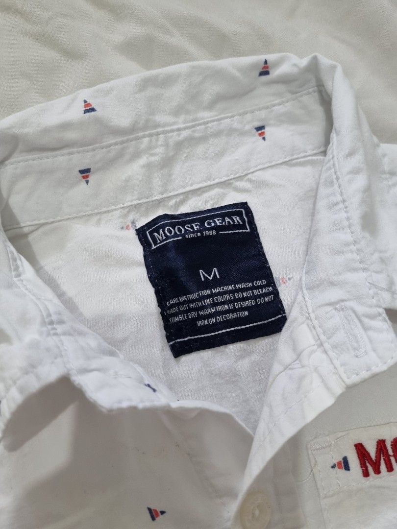 Moose Gear White Longsleeve Polo (Category: Babies & Kids Fashion) located in Quezon City. Submitted by TaraSelling (Listing ID 1382550389, Image 3). Description: Size on tag: medium fits: up to 2yo.