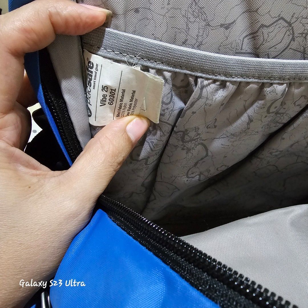 Pacsafe Vibe 25 Backpack (Category: Backpacks) located in Quezon City. Submitted by bagsforless16 (Listing ID 1382540448, Image 2). Description: Anti-Theft RFID Backpack 2 Main Zip Compartments Laptop, Tablet Padded Slot Multiple Organizer 2 Side Pockets Lockable Zips Water Resistant Adjustable Strap Recycled Polyester Size: 18.9" x 11" x 7.5".