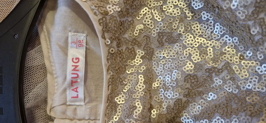 Party dress (Category: Babies & Kids Fashion) located in Kuala Lumpur. Submitted by peihwa7 (Listing ID 1382559883, Image 3). Description: Golden beige party dress. Sequins are intact..