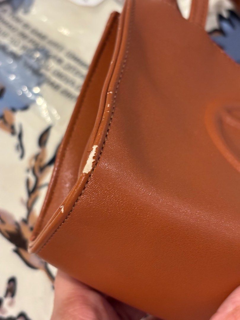 The Carry Telfar Small Shopping Bag (Category: Luxury Bags & Wallets) located in Imus. Submitted by yummyfinds (Listing ID 1382545269, Image 3). Description: Please refer to the photos for the flaws and issues of the item. Color Tan Originally bought from US for $150.