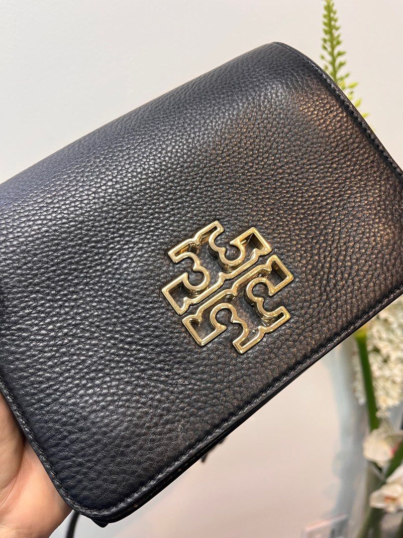 Tory Burch Britten Black Flap Crossboday Bag (Category: Luxury Bags & Wallets) located in Taguig. Submitted by mhalet.902 (Listing ID 1382599359, Image 3). Description: Inclusion : Original Dust Bag Details item description: the item has dents on the hardware..