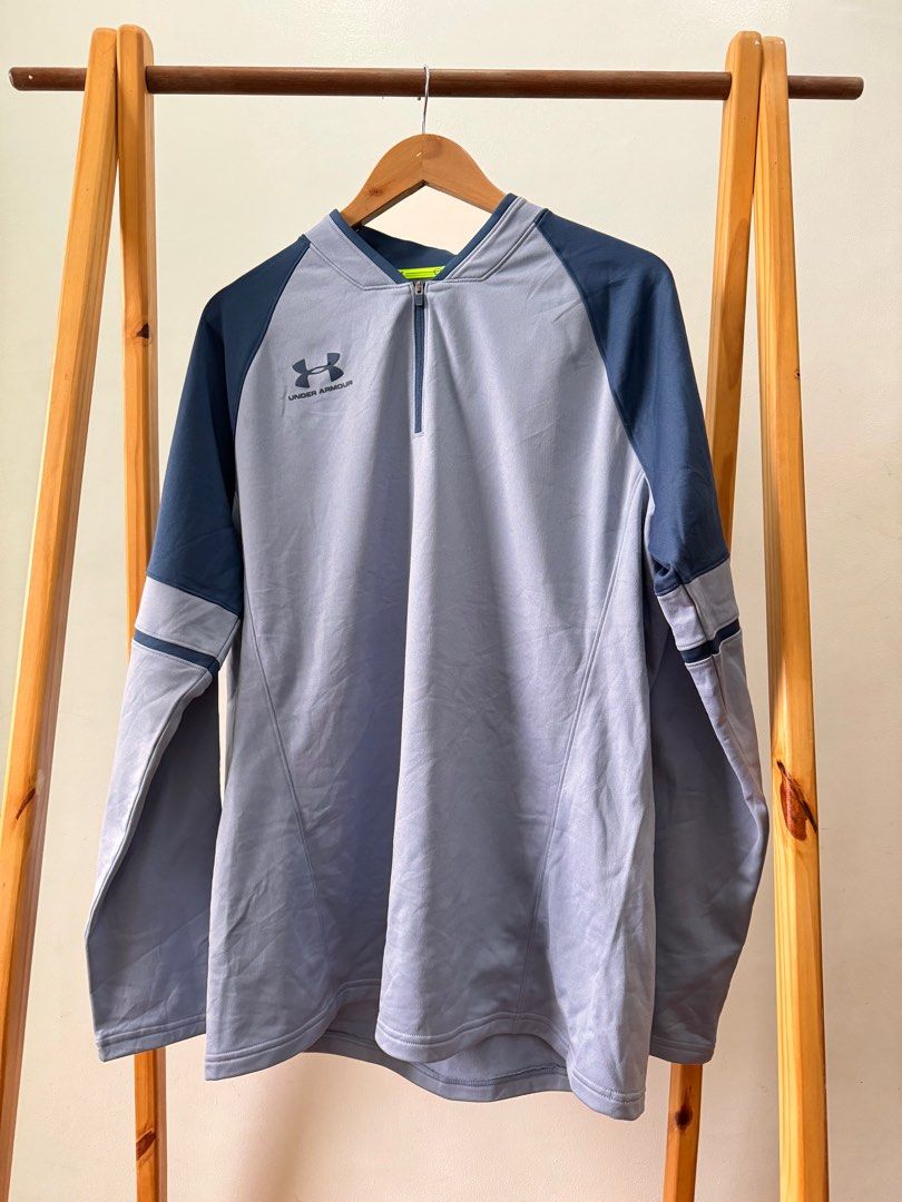Under Armour Quarter-Zip Long Sleeve Pullover (Category: Coats, Jackets and Outerwear) located in Makati City. Submitted by thiftdirection (Listing ID 1382496116, Image 1). Description: Under Armour Quarter-Zip Long Sleeve Pullover Elevate your performance and your look with this sleek Under Armour long-sleeve athletic pullover. Designed with a sharp combination of light gray and navy blue, this piece offers both comfort and style for your workou