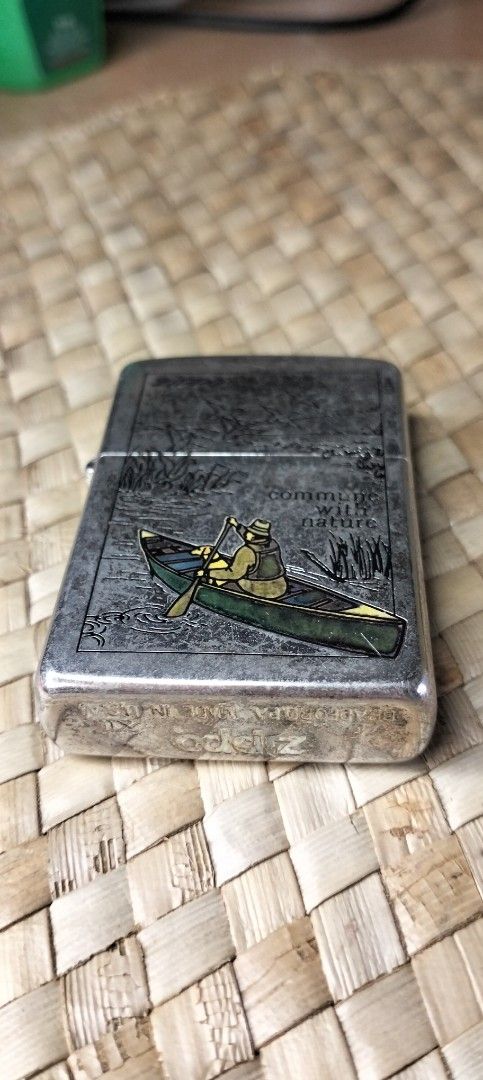 Zippo Lighter Vintage 1996 With Etched Design " Commune With Nature " Made In BRADFORD PA USA (Category: Vintage Collectibles) located in Pasig City. Submitted by Unikko75 (Listing ID 1382505537, Image 2). Description: Vintage 1996 Zippo Lighter With Etched Design " Commune With Nature " Made In BRADFORD PA USA Lighter needs Flint ( Bato ng Lighter ) And Gas Fluid. Price : 2,200. Selling As Is Condition..