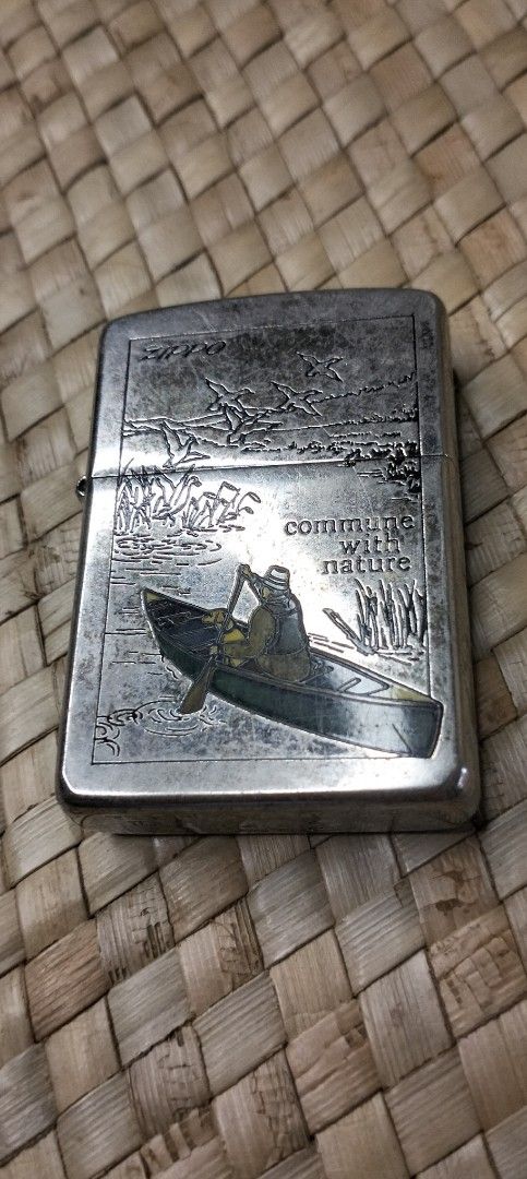 Zippo Lighter Vintage 1996 With Etched Design " Commune With Nature " Made In BRADFORD PA USA (Category: Vintage Collectibles) located in Pasig City. Submitted by Unikko75 (Listing ID 1382505537, Image 3). Description: Vintage 1996 Zippo Lighter With Etched Design " Commune With Nature " Made In BRADFORD PA USA Lighter needs Flint ( Bato ng Lighter ) And Gas Fluid. Price : 2,200. Selling As Is Condition..
