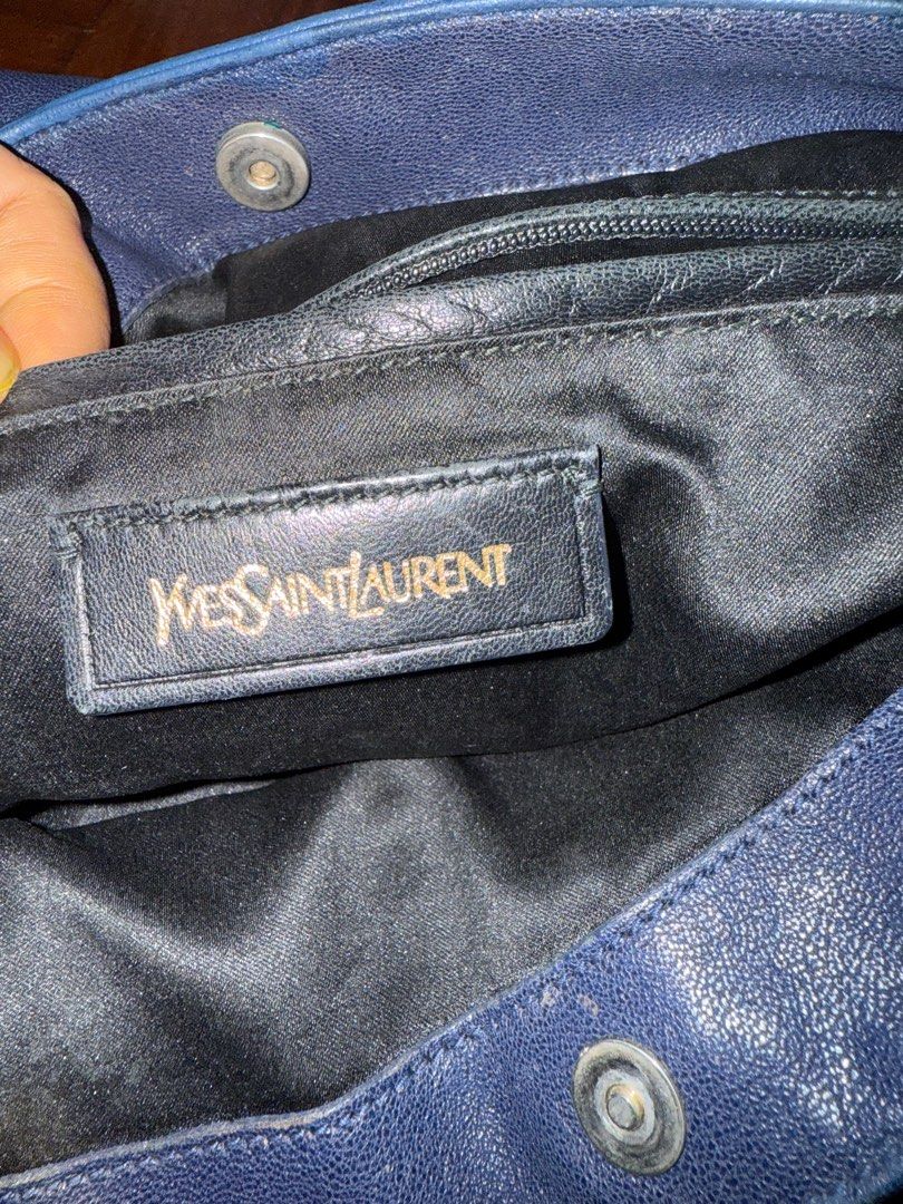 YSL ROADY (Category: Shoulder Bags) located in Quezon City. Submitted by lux4less4u (Listing ID 1382592525, Image 2). Description: IN good condition. Refer to the kast pic for the flaw, there is a watermark spot. Clean inside out. Comes with dustbag and cards. Guaranteed Authentic or your money back.