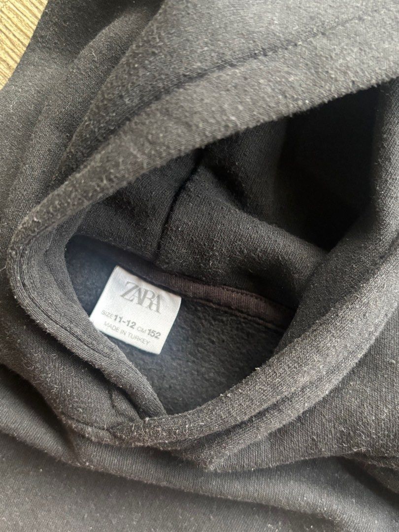 Zara hoodie for 10-12 yo (Category: Babies & Kids Fashion) located in Makati City. Submitted by lastpiece (Listing ID 1382554328, Image 3). Description: Zara store bought Cotton hoodie pullover Size 11-12 for 10-12 yo Color: black Used with care no tears no stains.