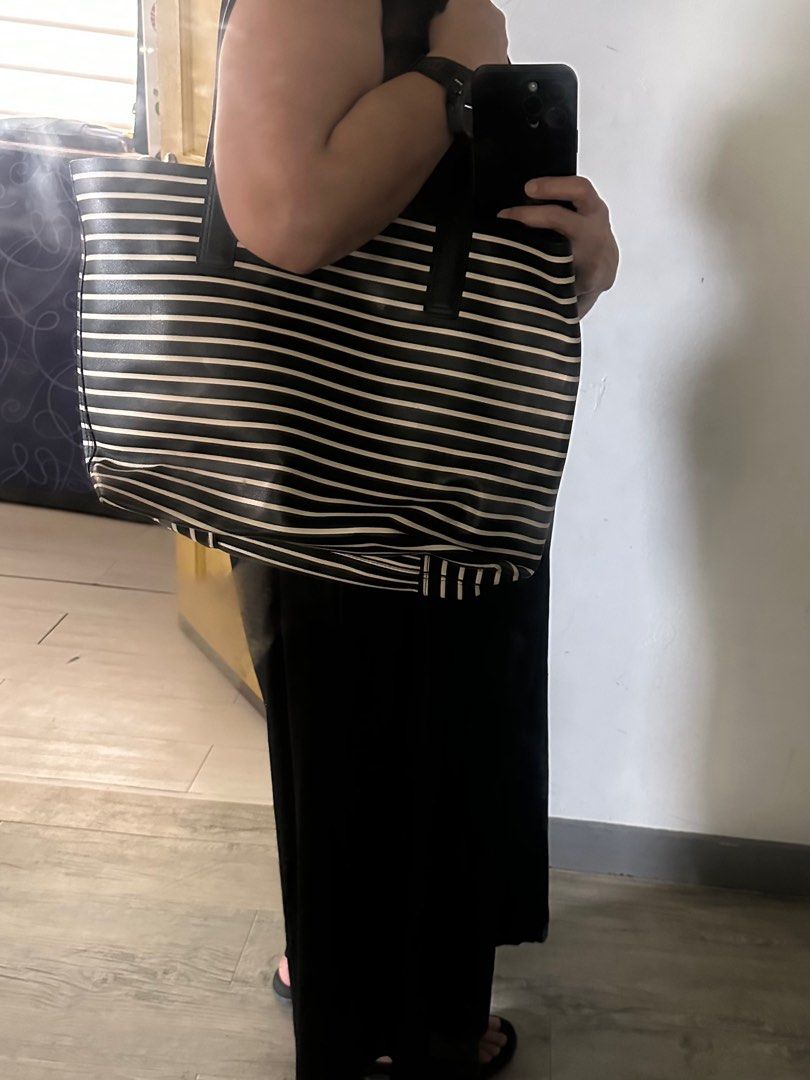 Authentic Kate Spade bag. Stripes - black and white (Category: Shoulder Bags) located in Taguig. Submitted by MNugget (Listing ID 1382750818, Image 3). Description: Original/Authentic Kate Spade. Bought in the US. Used 1x only. Need to declutter..