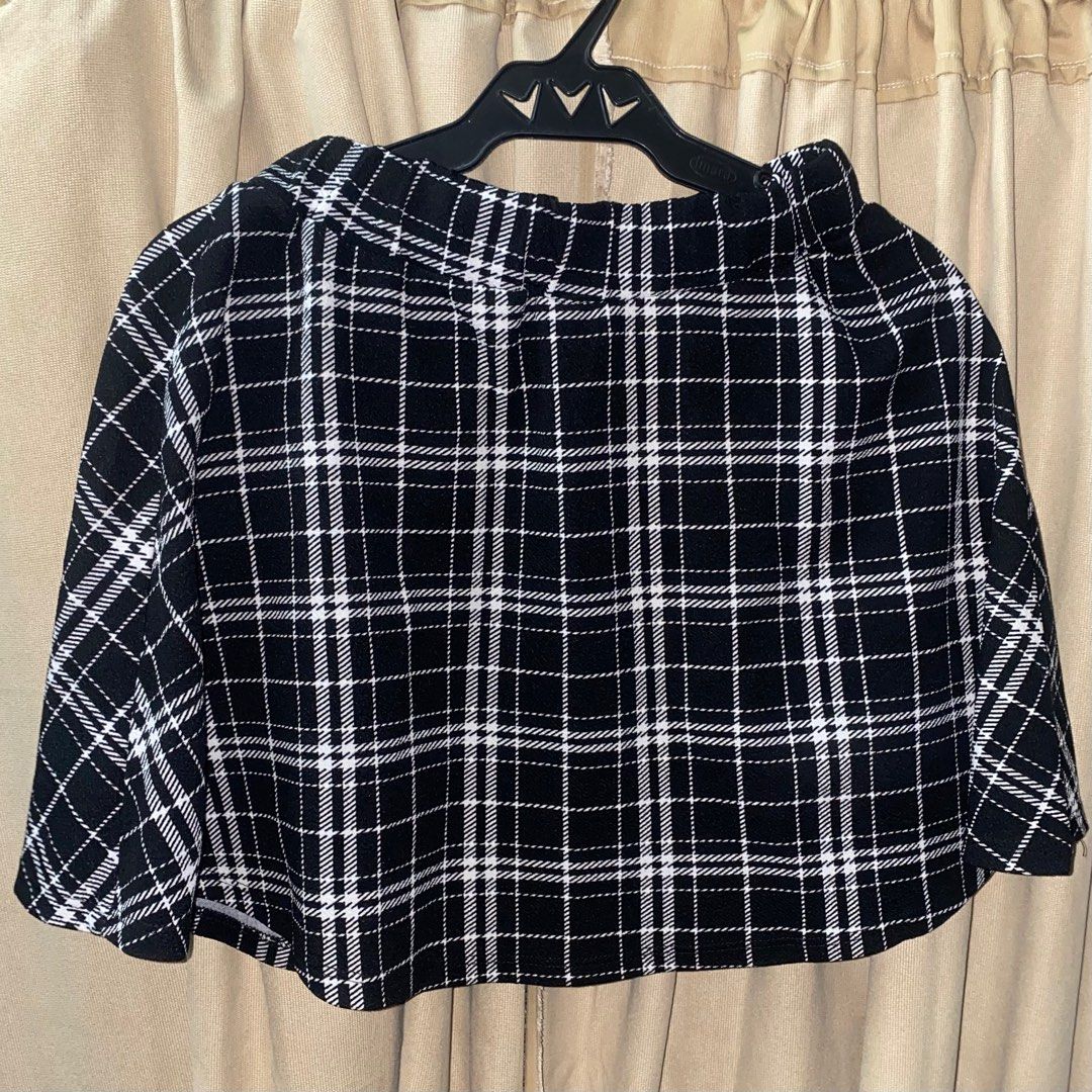 Black and White Plaid Alt/Goth Mini Skirt (Category: Skirts) located in Manila. Submitted by secanhanrin (Listing ID 1382835765, Image 1). Description: ★ Black and White Plaid Mini Skirt ★ Perfect for casual/everyday look or goth/alt aesthetic ★ Shein brand ★ Stretchy fabric ★ Waist: 26” to adjustable (garterized waist), Length: 16.5” ★ Used a few times ★ 10/10 condition ★ RFS: Not using anymore/need funds ★ Pre-loved item, please manage expectat