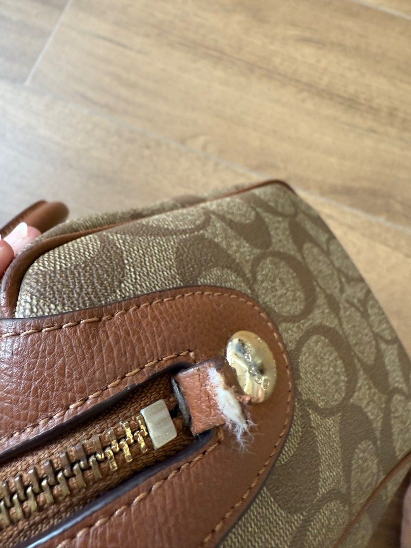Coach sling bag (Category: Luxury Bags & Wallets) located in Cebu City. Submitted by tiffy_blantz (Listing ID 1382743222, Image 2). Description: Coach sling bag comes with tag, gift reciept, and paperbag with defect see attached photo 3800 only.