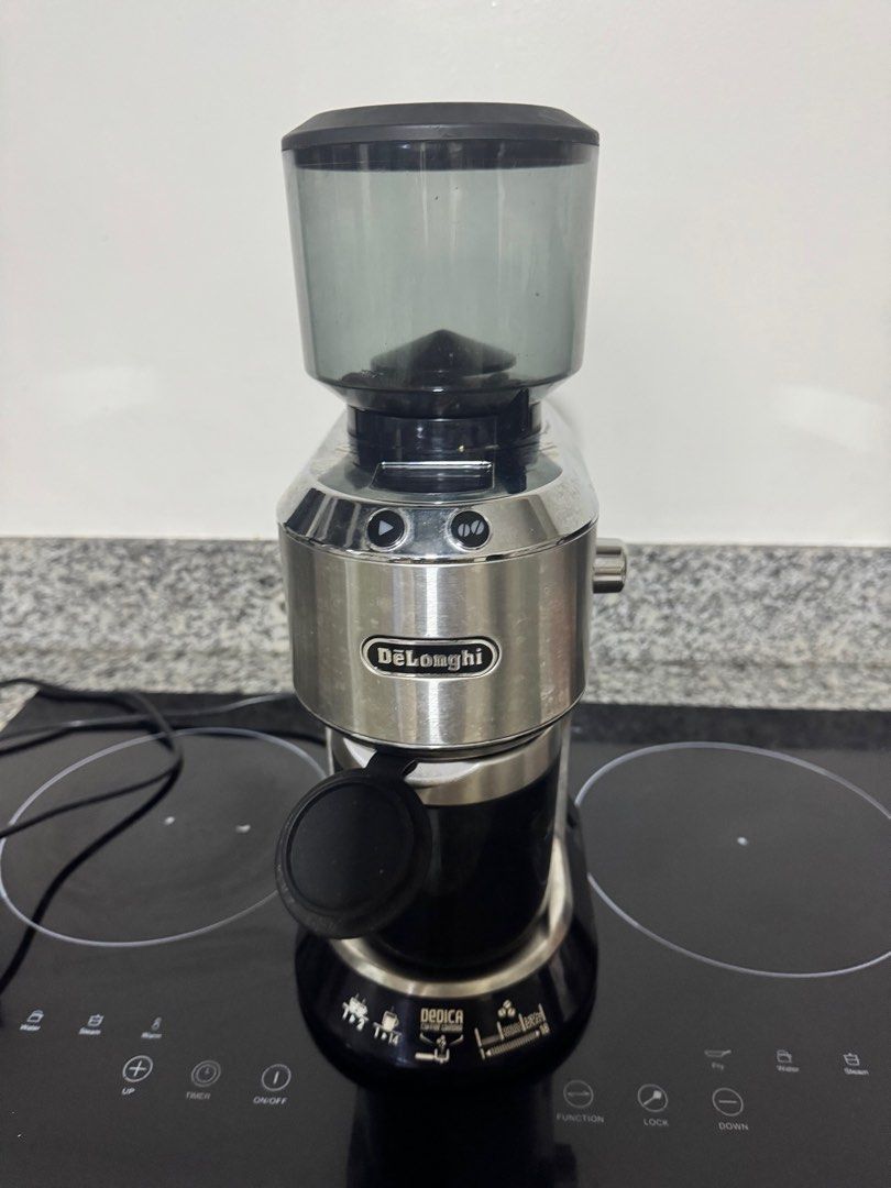 Delonghi Coffee Grinder (Category: Coffee Machines & Makers) located in Quezon City. Submitted by lexieshuu162243 (Listing ID 1382843801, Image 1). Description: Delonghi coffee grinder. Bought for 16,910 Rfs: there's another coffee machine.