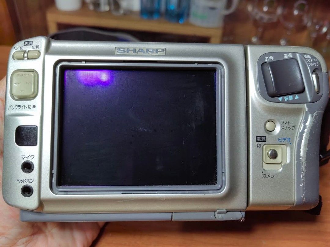 Digital Camcorder Camera SHARP Viewcam VL-EX2 (Category: Cameras) located in Cebu City. Submitted by dudes_villanueva (Listing ID 1382697930, Image 3). Description: Digital Camcorder Camera SHARP Viewcam VL-EX2 📌Wide Conversion Lens 📌30x Digital Zoom 📌PCM Stereo Note: Untested. No Battery. Battery slot looks good and intact. Sold as is condition. All purchases considered final and non refundable. Buy at your own risk.
