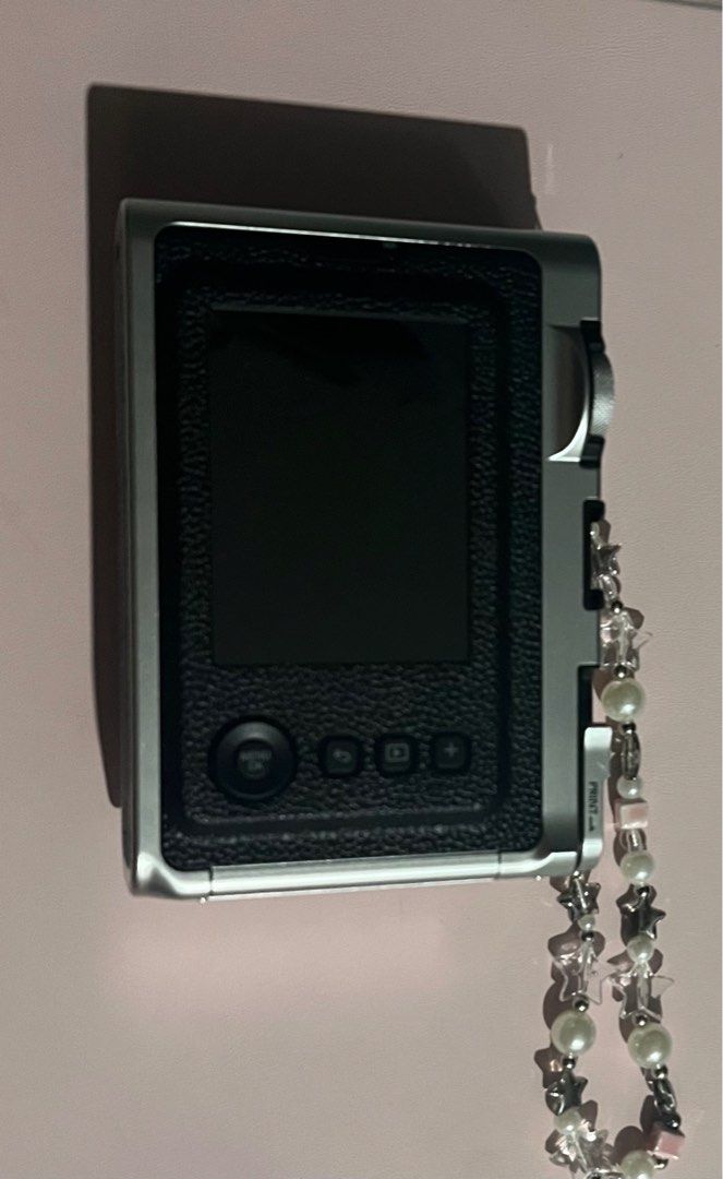 Fujifilm Instax Hybrid Digicam (Category: Cameras) located in Manila. Submitted by an.jujuu (Listing ID 1382846039, Image 2). Description: inclusions include (box, charger and manual) plus free accessories, bag and memory card. Works both as a digicam and a film camera.