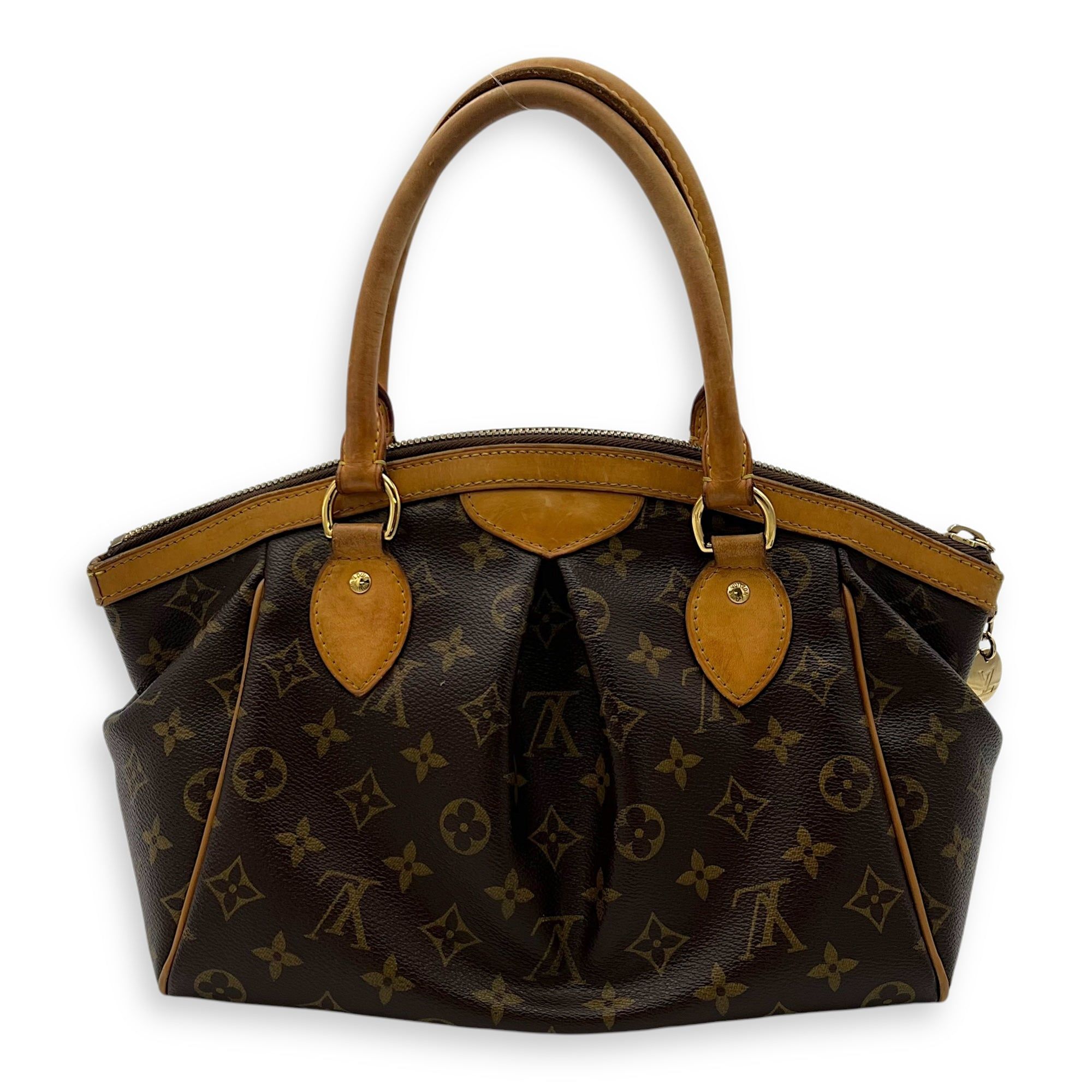 Louis Vuitton Tivoli Top Handle Bag Small Brown in Monogram Coated Canvas, Gold hardware (Category: Bags & Wallets) located in Singapore. Submitted by carousellluxury (Listing ID 1351650087, Image 2). Description: SKU OS2412-003151LP Material Monogram Coated Canvas Size Small Color Brown Hardware Gold Strap Not IncludedDimension (L)36cm x (H)22cm x (W)13.5cm Accessories Series AR0083 Circa Est 2003 Microchipped FALSE - Surface: Scratches through 