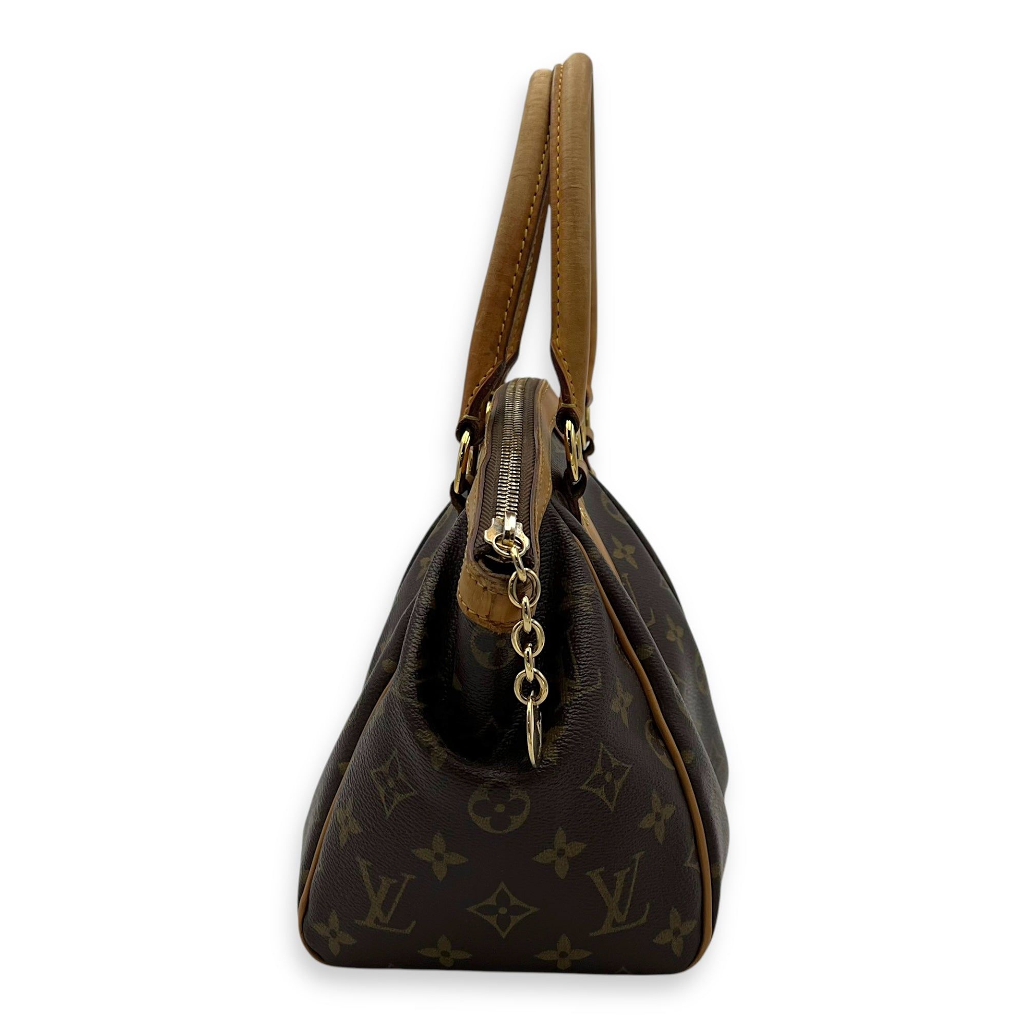 Louis Vuitton Tivoli Top Handle Bag Small Brown in Monogram Coated Canvas, Gold hardware (Category: Bags & Wallets) located in Singapore. Submitted by carousellluxury (Listing ID 1351650087, Image 3). Description: SKU OS2412-003151LP Material Monogram Coated Canvas Size Small Color Brown Hardware Gold Strap Not IncludedDimension (L)36cm x (H)22cm x (W)13.5cm Accessories Series AR0083 Circa Est 2003 Microchipped FALSE - Surface: Scratches through 