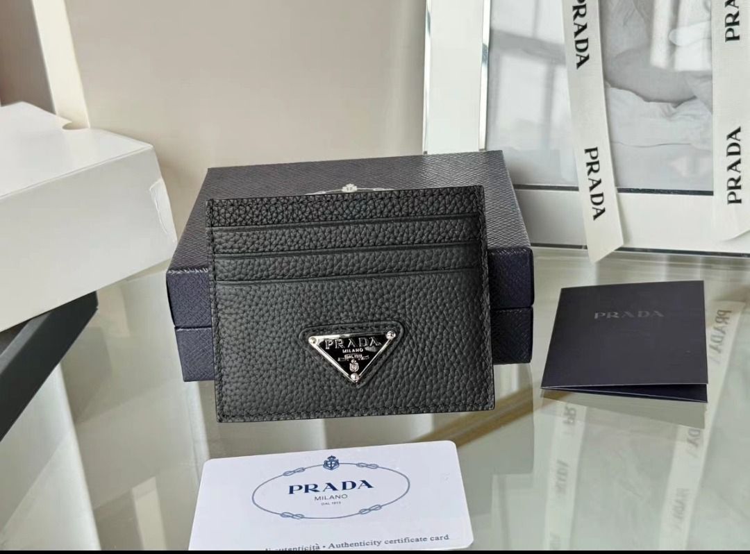 Prada Leather Card Holder (Category: Luxury Bags & Wallets) located in Manila. Submitted by closett_plug (Listing ID 1382700719, Image 3). Description: Main materials: Deer Grain Leather, Enamel metal appliques Size: Length 10cm Height 8cm - Pre-order 7-10 Days ETA ( consolidated box ) - 50% deposit required - I get these from overseas, strictly no cancellation, return & refund - Refrain from chatting if you have doubts, let's not waste each othe