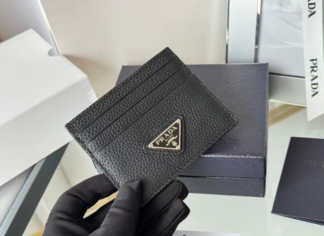 Prada Leather Card Holder (Category: Luxury Bags & Wallets) located in Manila. Submitted by closett_plug (Listing ID 1382700719, Image 1). Description: Main materials: Deer Grain Leather, Enamel metal appliques Size: Length 10cm Height 8cm - Pre-order 7-10 Days ETA ( consolidated box ) - 50% deposit required - I get these from overseas, strictly no cancellation, return & refund - Refrain from chatting if you have doubts, let's not waste each othe