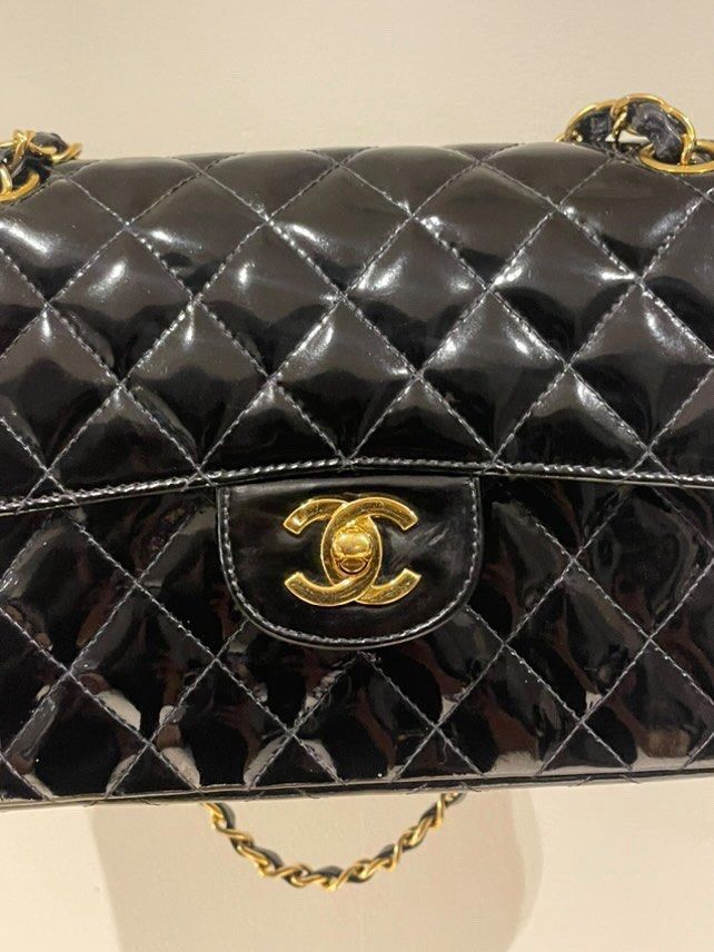 Rare Authentic Chanel Double Faced Flap Small Size (Category: Luxury Bags & Wallets) located in Manila. Submitted by beaumontandco (Listing ID 1382828727, Image 1). Description: Rare find! With dustbag and entrupy! Chanel double faced flap Vintage Patent leather Pm for more photos.