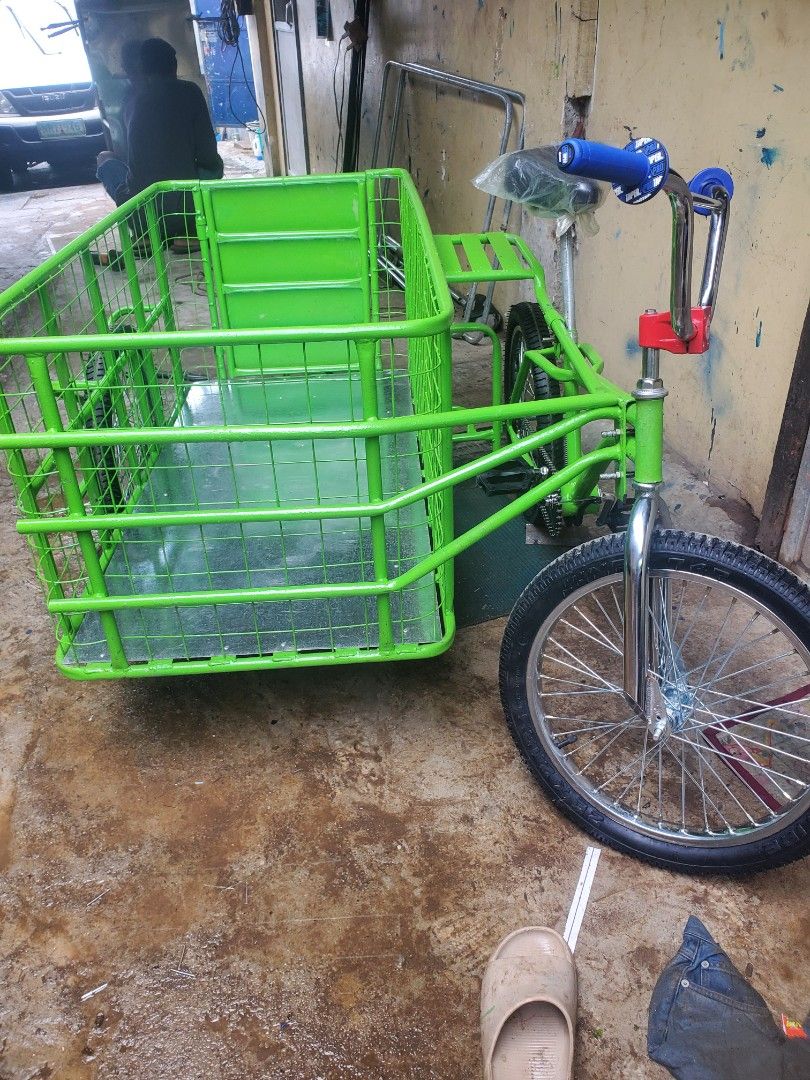 Sidecar extended size with bike (Category: Bicycles) located in Manila. Submitted by fastmountain_dfe013 (Listing ID 1382801509, Image 1). Description: custom made long size sidecar,with door wrapped steel matting,plain sheet flooring. brand new GI bike naka foot brake,regular tire size 20x2.125.. location ..payatas QC.