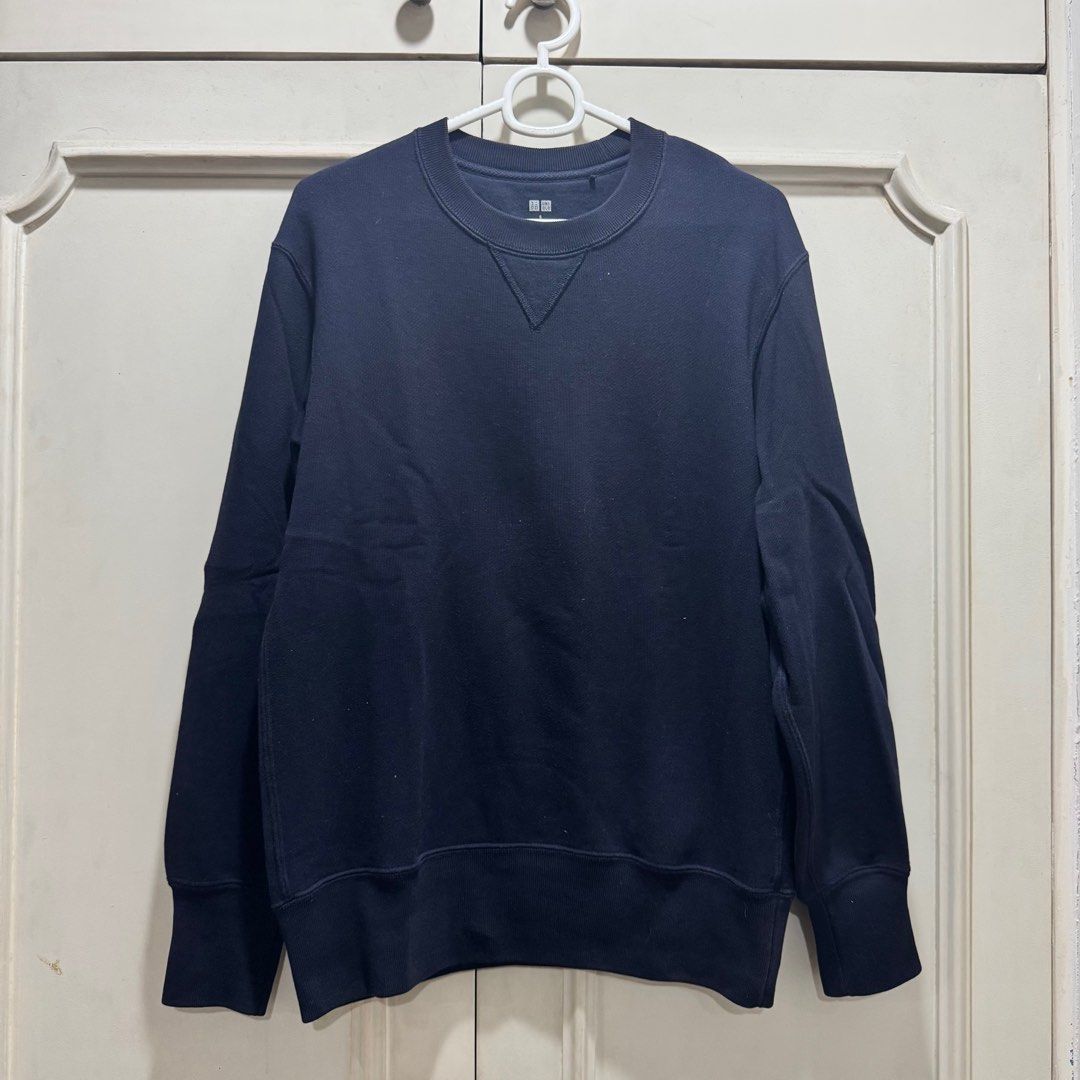 UNIQLO Crewneck Sweater (Category: Sleep and Loungewear) located in Manila. Submitted by bennythrift (Listing ID 1382834637, Image 1). Description: UNIQLO Crewneck Sweater (Navy) - Authentic - Well used - No major blemishes Size: Small Shoulder: 18 inches Sleeve: 22 inches Chest: 19 inches Length: 26.5 inches Hem: 16 inches.