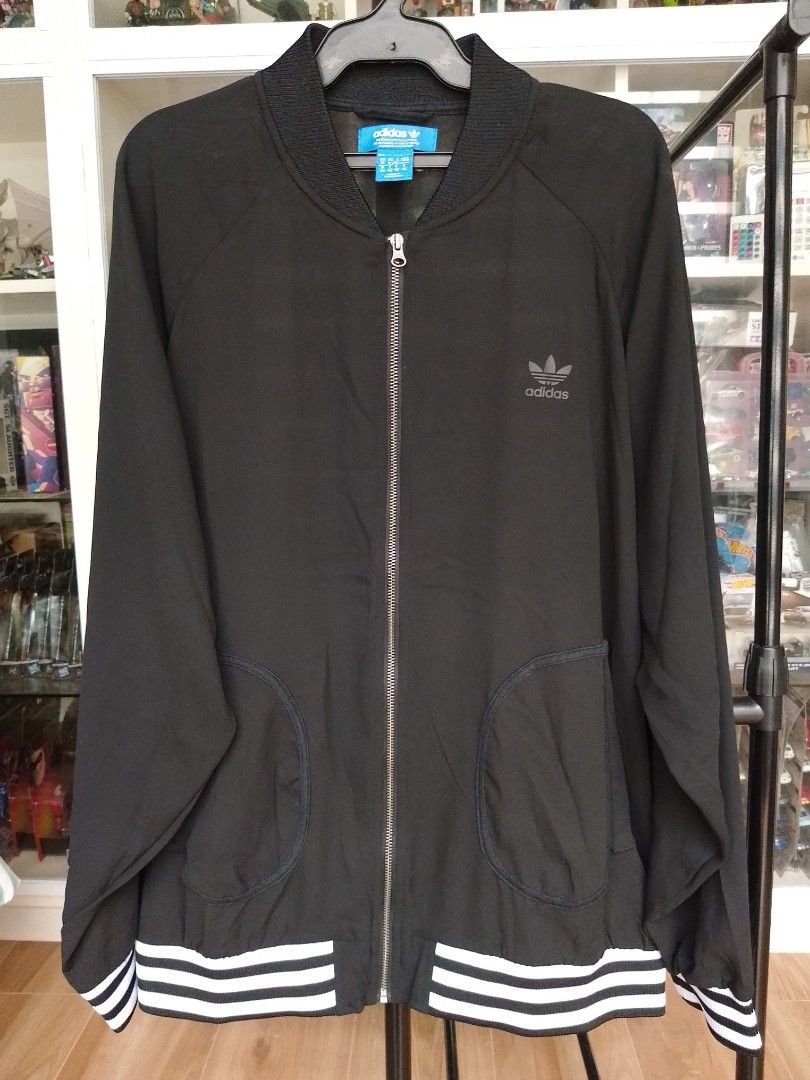 Adidas Originals Bomber Jacket (Category: Coats, Jackets and Outerwear) located in Antipolo. Submitted by zouk0ut (Listing ID 1382896140, Image 1). Description: Adidas Originals Bomber Jacket * almost new, authentic, semi see through, with 2 side pockets, classic color & design Size: US M Color: Black & White Dimensions: W - 24 in, L - 27 in Price: PHP 300 Meet up points: Town and Country Heights Chapel, Antipolo Cathedral (plus PHP 50) Courier: 