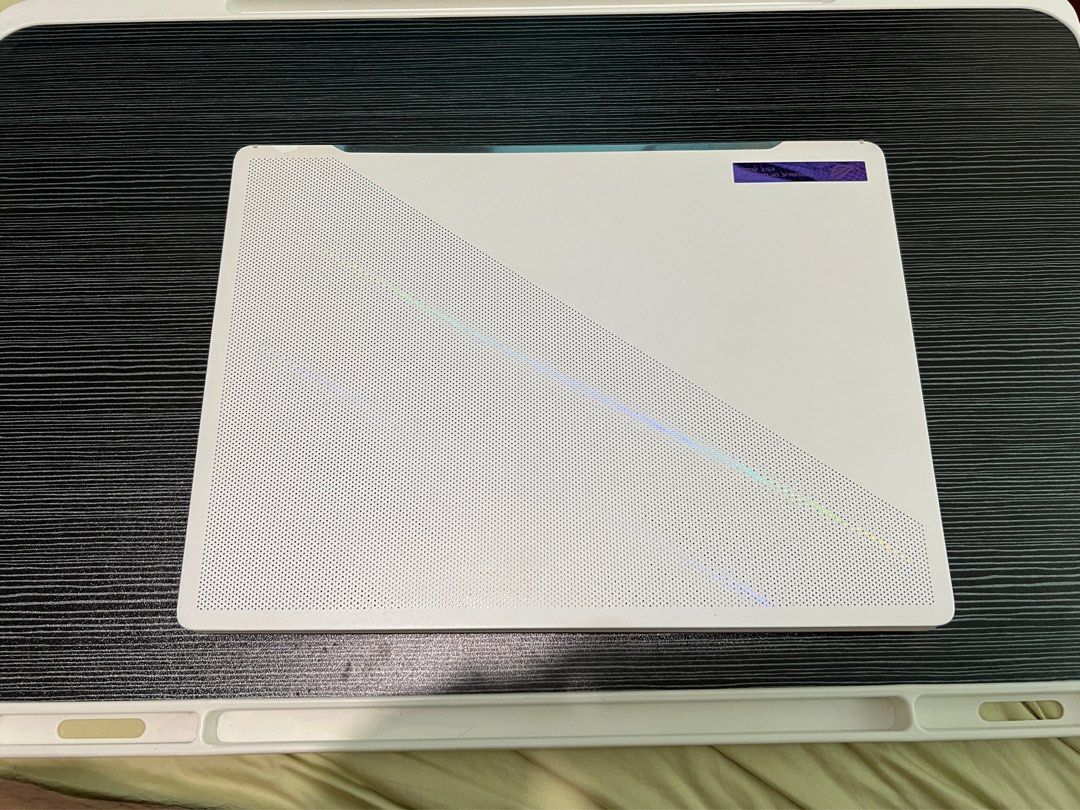 ASUS ROG Zephyrus G14 GA402RJ 2022 (Category: Laptops & Notebooks) located in Quezon City. Submitted by libanganstreet (Listing ID 1382935658, Image 2). Description: PROCESSOR: AMD Ryzen™ 7 6900HS DISPLAY: 14” QHD+ 16:10 (2560 x 1600, WQXGA) MEMORY: 8GB DDR5 + 8GB DDR5-4800 SO-DIMM STORAGE: 1TB PCIe® 4.0 NVMe™ M.2 SSD GPU: AMD Radeon™ RX 6700S OS: Windows 11 Home COLOR: Moonlight White Condition: See pics, as is.