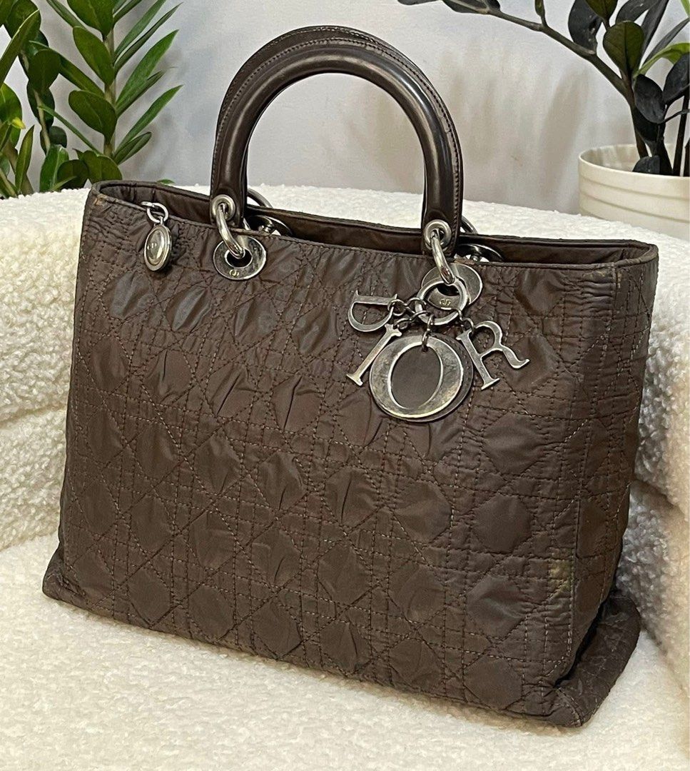Authentic Dior (Category: Luxury Bags & Wallets) located in Manila. Submitted by chloe_luxuries (Listing ID 1383018415, Image 2). Description: Guaranteed original Vintage Lady Dior on silver hardware Still in good condition no major flaws just need color in hançer Comes with longstrap authenticity card and booklet Pm for those interested.