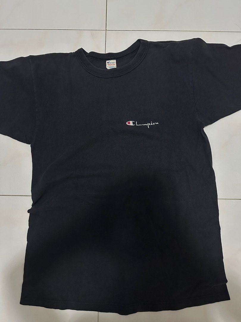 Champion Basic Logo Tee (Category: Shirts) located in Singapore. Submitted by blacksesamewaffles (Listing ID 1383062107, Image 1). Description: vintage / thrifted from bkk! colour's really pretty irl - not the usual black :) would look so cute styled with mini shorts/skorts +$2.50 for singpost normal mailing.