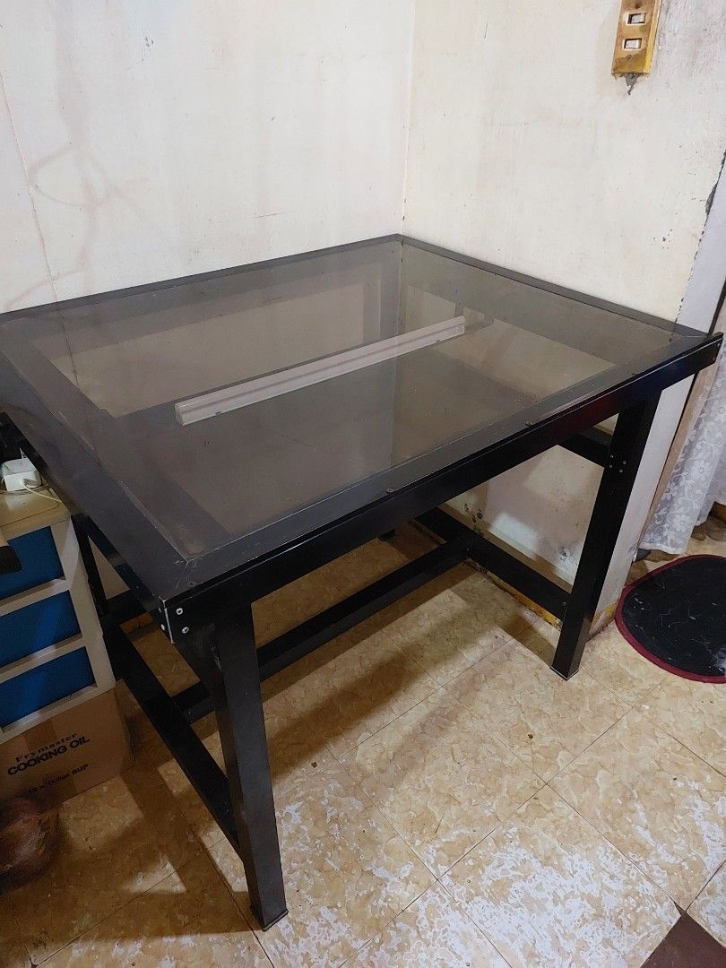 Customized Glass Drafting Table (Category: Tables & Sets) located in Dasmarinas. Submitted by unclaire (Listing ID 1382975251, Image 1). Description: Customized Glass Drafting Table - Dimension: W 1m x D 0.81m x H 0.84m - has LED light good for tracing (LED light is new) - has t-square stopper - has storage for cannisters and drafting materials - has one inclination angle only - used this for 2 years only Issue: - may crack sa glass ng storage pw