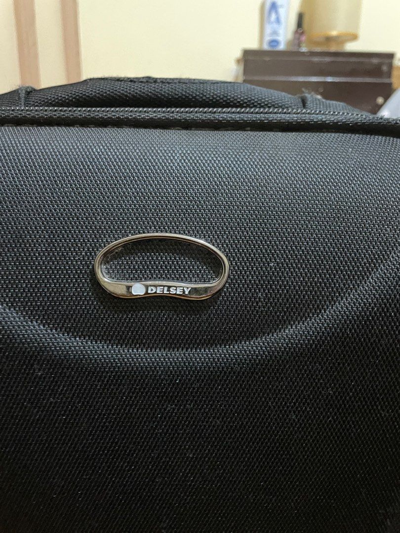 Delsey Medium Size Luggage (Category: Luggage) located in Baguio. Submitted by soulidstate (Listing ID 1382885051, Image 1). Description: Original Delsey Luggage, fabric type, hard shell. Dimension: Medium size; 24x15x9 inches Doesn't have TSA lock. Traditional lock with keys is used to secure. Set of lock included. Very sturdy, not abused. Has propective plate at the bottom and there is reinforcement too.it also has feet on the side too. Well bu
