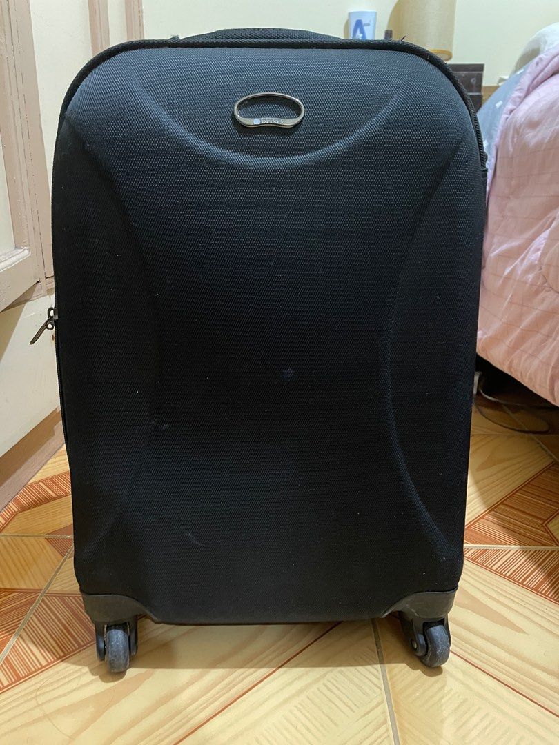 Delsey Medium Size Luggage (Category: Luggage) located in Baguio. Submitted by soulidstate (Listing ID 1382885051, Image 2). Description: Original Delsey Luggage, fabric type, hard shell. Dimension: Medium size; 24x15x9 inches Doesn't have TSA lock. Traditional lock with keys is used to secure. Set of lock included. Very sturdy, not abused. Has propective plate at the bottom and there is reinforcement too.it also has feet on the side too. Well bu