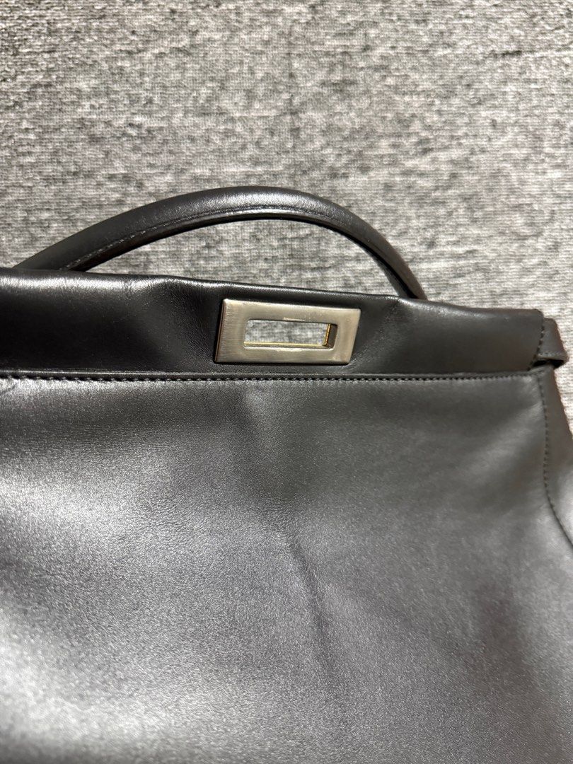 Fendi peekaboo large (Category: Luxury Bags & Wallets) located in Makati City. Submitted by markussangabriel (Listing ID 1382994637, Image 3). Description: One stud is replaced. Negotiable :) Comes with entrupy certificate .