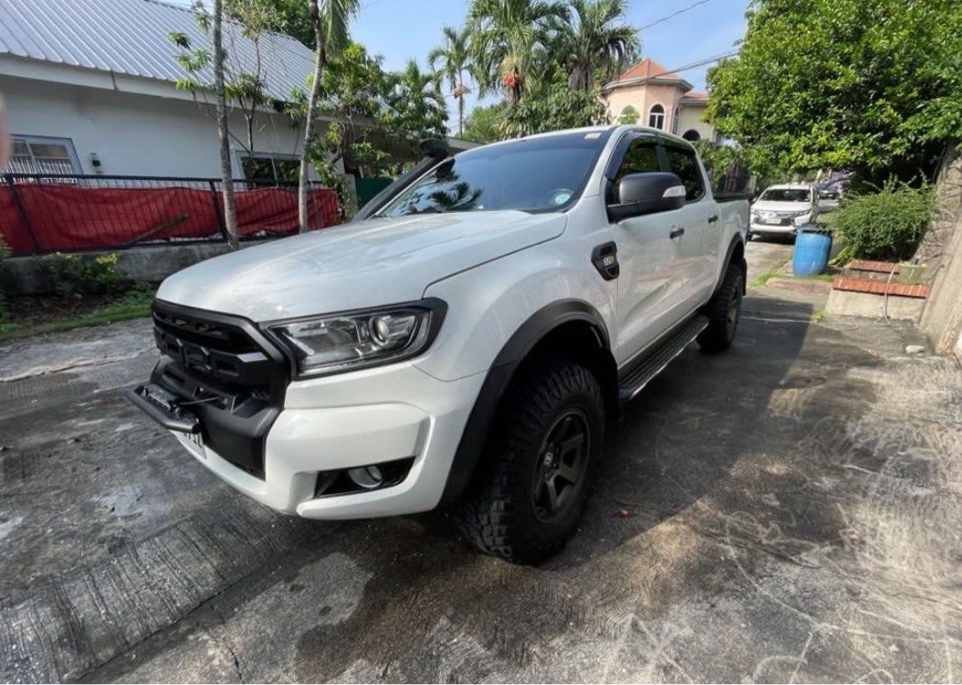 Ford Ranger (Category: Used Cars) located in Quezon City. Submitted by chrisryan (Listing ID 1382984584, Image 3). Description: For Sale 2016 Ford Ranger 4x2 XLT AT Well maintained - first owner - upgraded Shocks Ironman Nitrogas set 2 inch - 285/70/r17 Radar RT tires - Black Mamba Bronze color Rims 17 inch - Snorkel - soft trifold bed cover - Jaos mud flops - newly installed Led white low beam headlight - 90k mileage, never been used to trail or