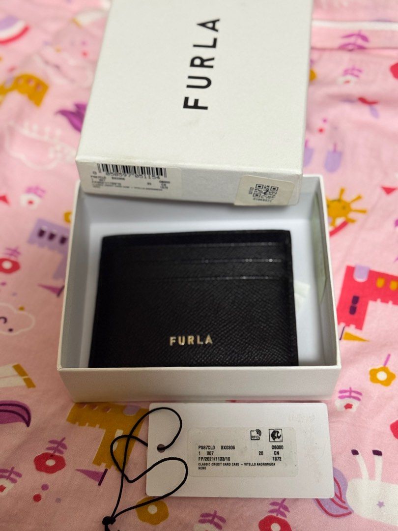 Furla Nero Card Holder (Category: Wallets & Card holders) located in Quezon City. Submitted by kmaeb (Listing ID 1383059603, Image 1). Description: Like brand new with box .