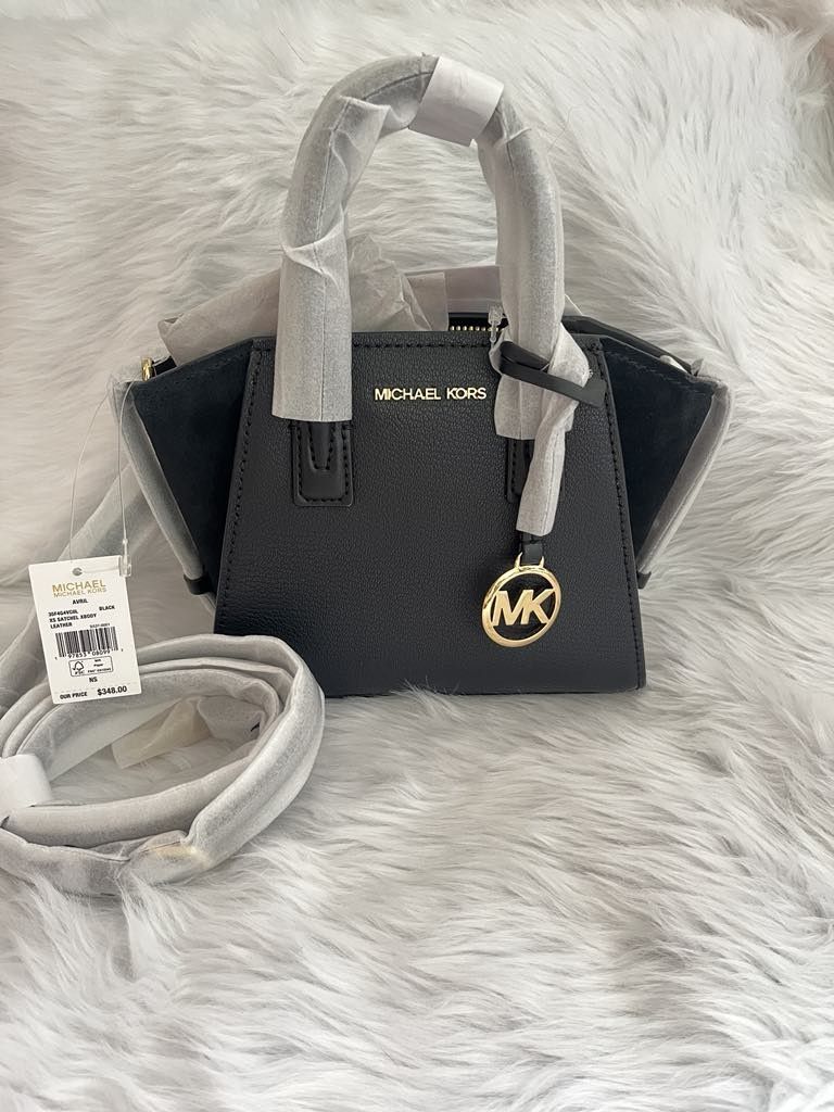 MK Avril Satchel sling bag small (Category: Luxury Bags & Wallets) located in Rizal. Submitted by blissfulgail (Listing ID 1382938358, Image 1). Description: - authentic with care card - bought in US - Delivery/pick up via Lalamove.