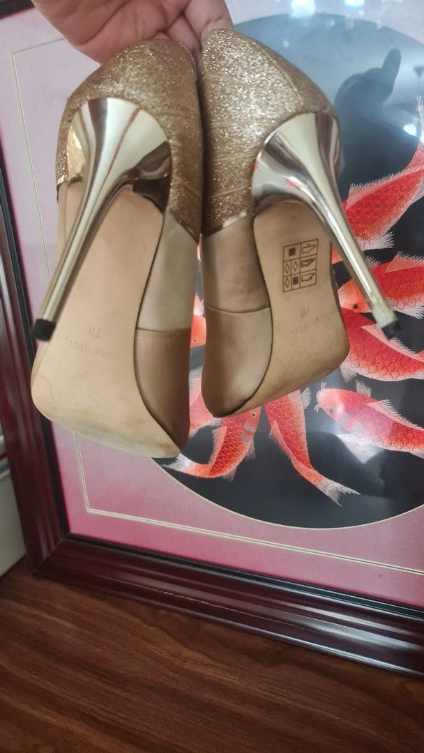 Nine West Gold 4-inch heels (Category: Heels) located in Quezon City. Submitted by Patrice_Shop (Listing ID 1383030929, Image 3). Description: Nine West Gold 4-inch heels (Fits Size 6-6.5). Insoles peeling. Php500. RFS: Moving Out. Location: QC. Contact: 09778145851.