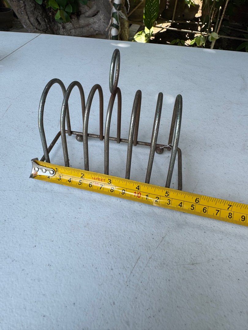 One piece toast rack (Category: Dinnerware & Cutlery) located in Davao. Submitted by parteawares2 (Listing ID 1383002654, Image 3). Description: One piece stainless steel toast rack made in Japan , please note that it has some oxidation and can be removed once cleaned .