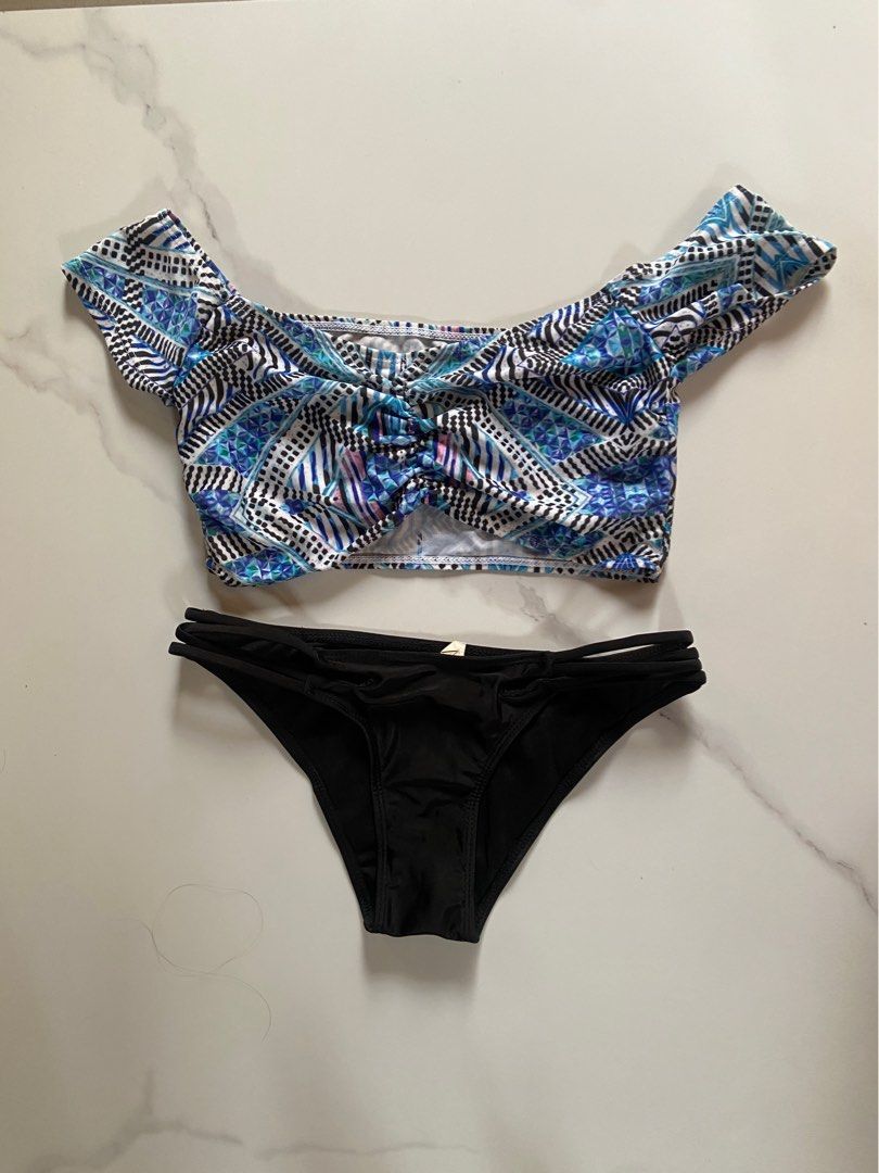 Printed Offshoulder Two-piece Bikini (Category: Bikinis & Swimsuits) located in Cebu City. Submitted by declutteringgstufff (Listing ID 1382979247, Image 1). Description: Size: Small Details: - no pads but has pad slots - bottom has a crisscross design - never used just tried it on RFS: Decluttering since I’ve got lots of bikinis already SF: Starts at Php60 through J&T.