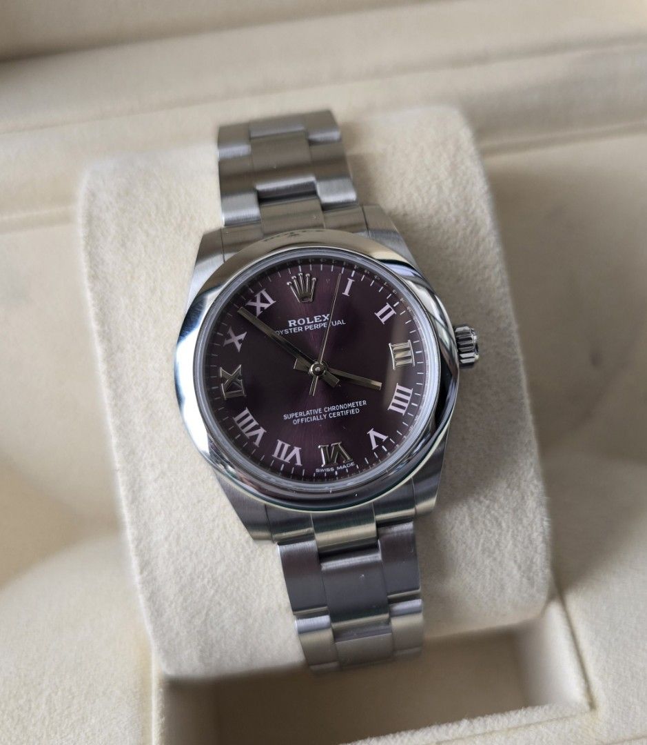 Rolex OP31 Grape (Category: Luxury Watches) located in Mandaluyong City. Submitted by 88nac (Listing ID 1382883243, Image 1). Description: ☂️☂️ 2019 Rolex OP31 Red Grape 31mm 2019 - Foreign AD 177200 Purple Dial Full set 9.8/10 condition 375k Negotiable PM for inquiries.