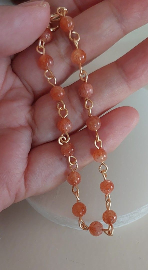 Sunstone bracelet (Category: Bracelets) located in Gapan. Submitted by purseofjune (Listing ID 1382937352, Image 3). Description: real sunatone beads and gold coated copper wire 17cm wrist size.