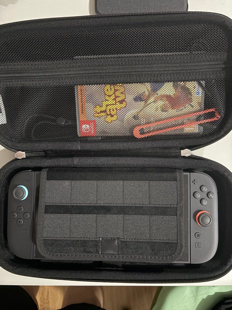 Switch 2 (Category: Nintendo) located in Quezon City. Submitted by john9642 (Listing ID 1383060676, Image 2). Description: Good as new with receipt Only used to test Comes with travel case and it takes two game cartridge.