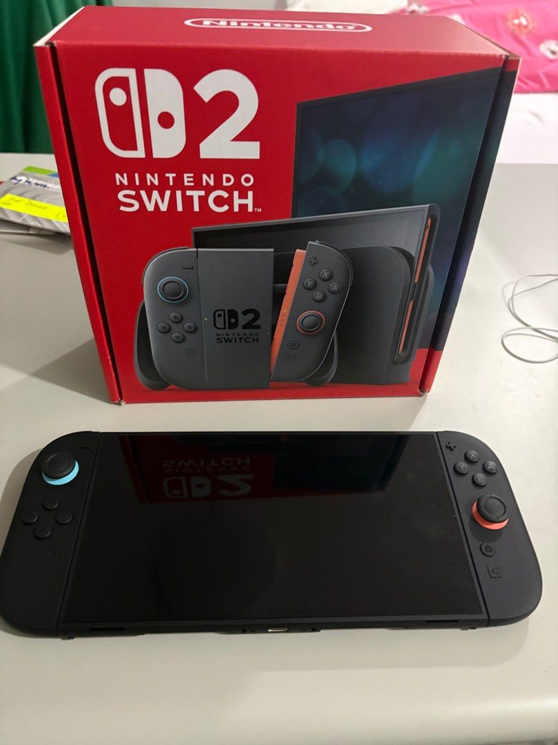 Switch 2 (Category: Nintendo) located in Quezon City. Submitted by john9642 (Listing ID 1383060676, Image 1). Description: Good as new with receipt Only used to test Comes with travel case and it takes two game cartridge.